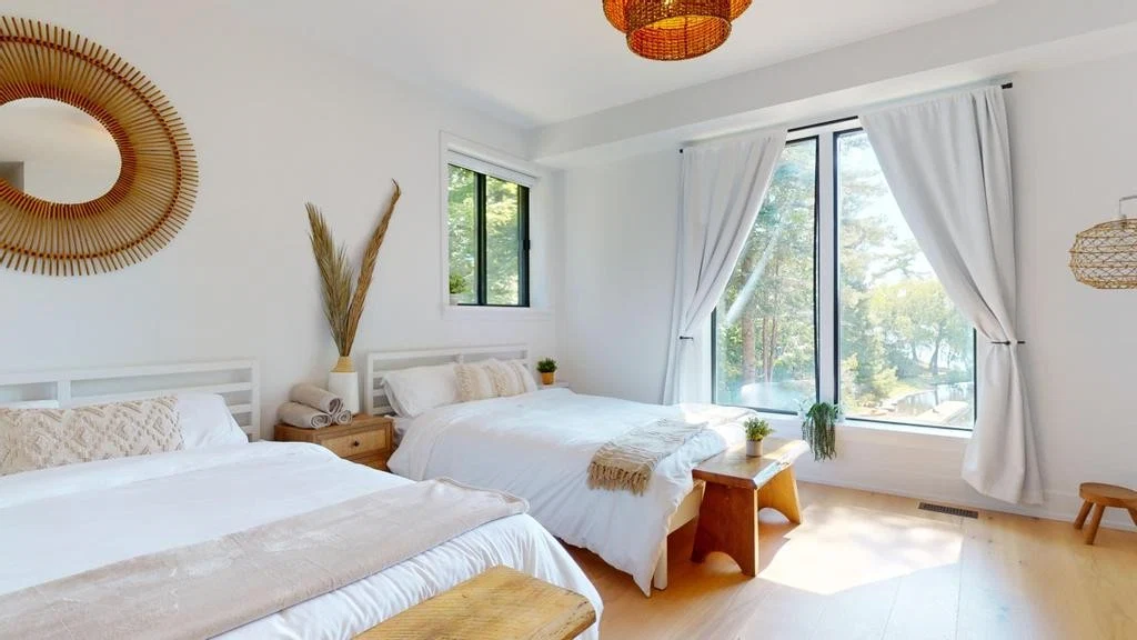 Main floor bedroom in soft neutrals